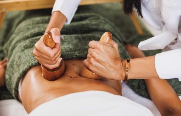maderotherapy-massage-with-wooden-cup-in-a-spa-cen-PHFSKTJ